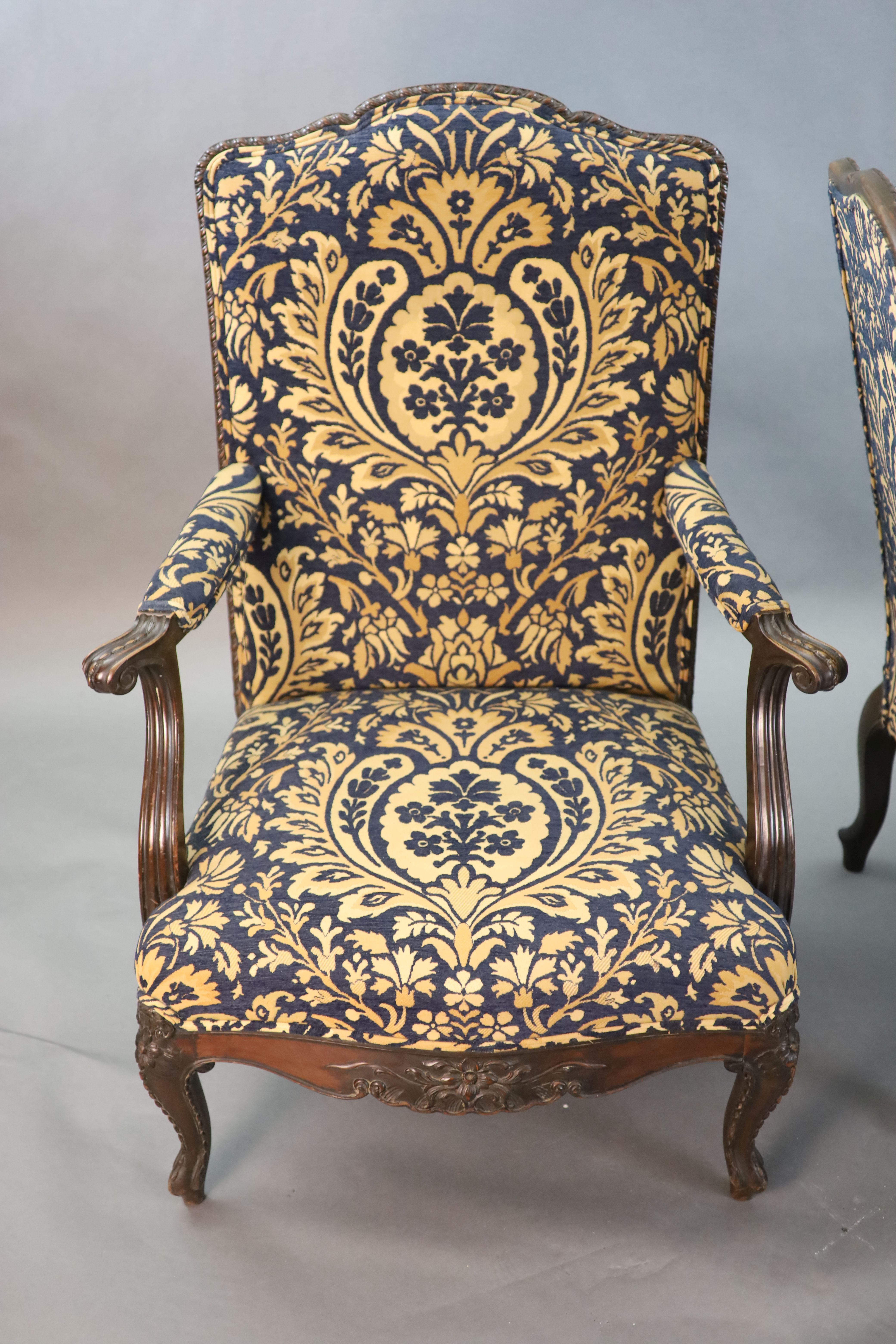 A pair of Louis XVI style mahogany fauteuils, W.2ft 6in. D.2ft 5in. H.3ft 6in.